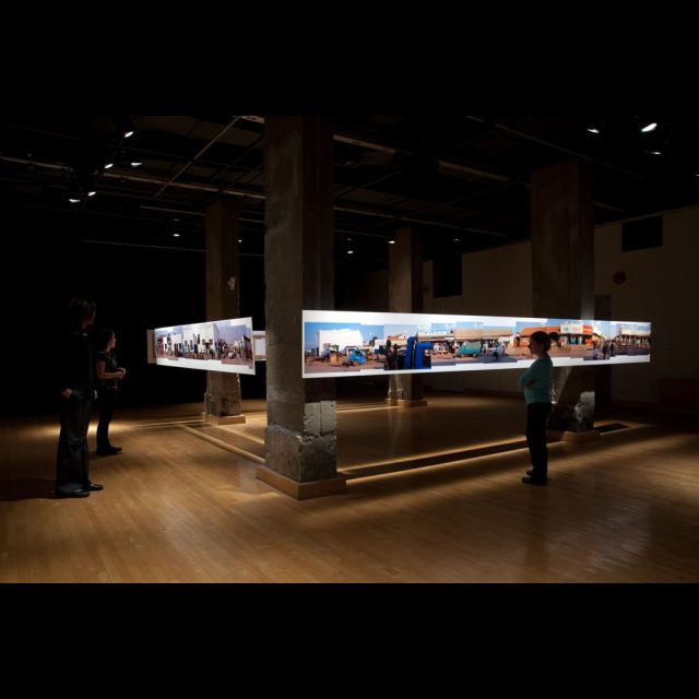 Vues des Likasi, 2005 (Installation detail.)<br>
Le Mois de la Photo à Montréal, 2009<br>
archival digital photograph on satin matte paper<br>
60 cm x 200m (installation length variable)<br>
24” x 656’ (installation length variable)