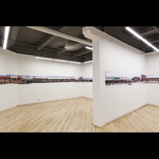 Vues des Likasi, 2005 (Installation detail.)<br>
Le Mois de la Photo à Montréal, 2009<br>
archival digital photograph on satin matte paper<br>
60 cm x 200m (installation length variable)<br>
24” x 656’ (installation length variable)