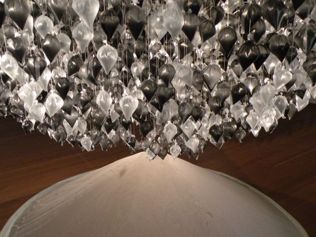 Water, carbon, cellophane, fishing line, sand<br>
Dimensions variable<br>
Installation: Ursula Bickle Foundation, Germany