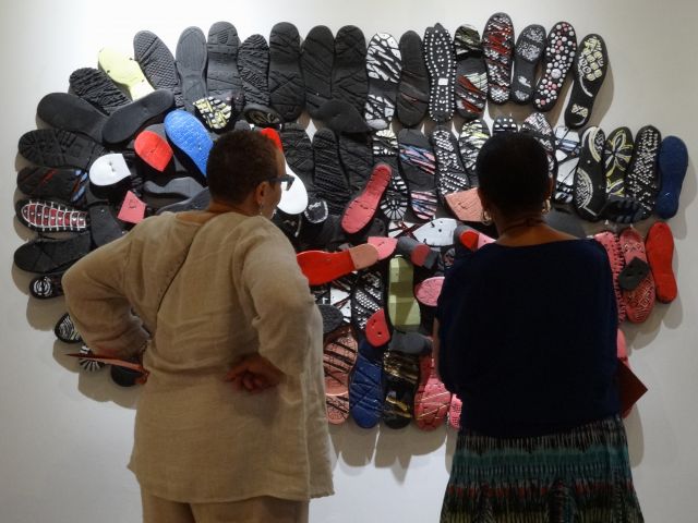 Shoe soles, paint, wire<br>
7” x 45”<br>
Installation: 1:54 Contemporary African Art Fair, New York, Axis Gallery 2015