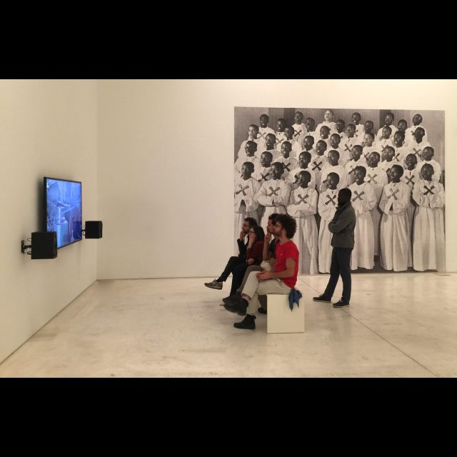 Tales of the Copper Cross Garden: Episode I (2017), installation view at documenta 14, Athens<br>
Video, photographs, copper plate, copper crosses, and coins