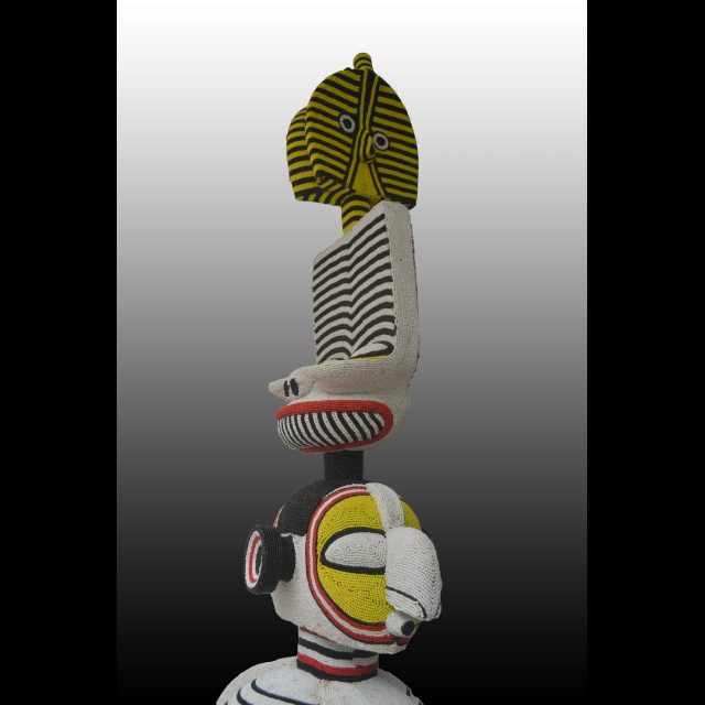 Wood, beads, glue, silicone mastic<br>
74” x 20 3/4” x 15 / 188 x 53 x 38 cm