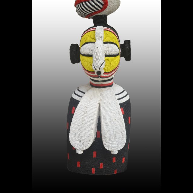 Wood, beads, glue, silicone mastic<br>
74” x 20 3/4” x 15 / 188 x 53 x 38 cm