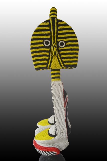 Wood, beads, glue, silicone mastic<br>
74” x 20 3/4” x 15 / 188 x 53 x 38 cm