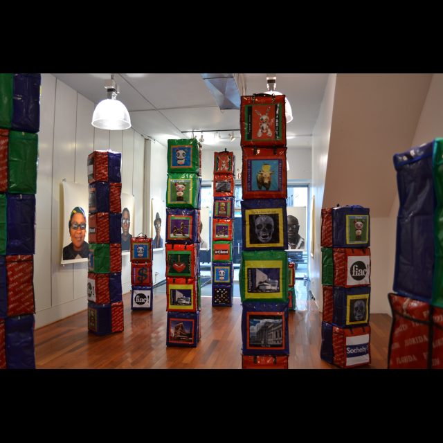 <i>Totems to Haunt Our Dreams,</i> Axis Gallery installation view, 2011.<br>
.<br>
Archival digital photographs on canvas <br> 80 x 120 cm / 31 1/2" x 47 1/4" <br> mixed media columns, dimensions variable