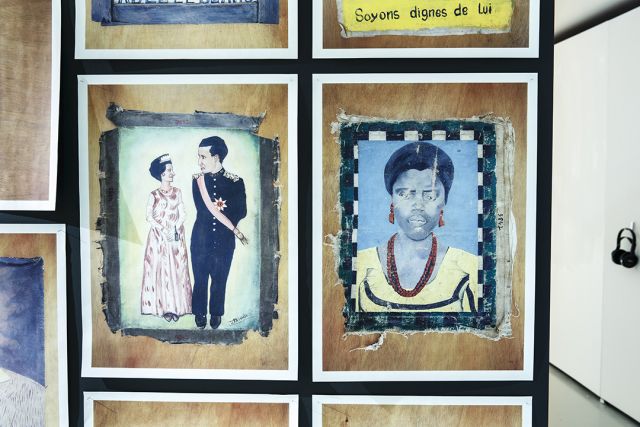 Detail of photographs of painted portraits<br>
Installation at Framer Framed, Amsterdam. © Eva Broekema