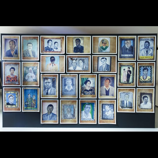 Installation View: photographs of painted portraits<br>
Installation at Framer Framed, Amsterdam. © Eva Broekema
