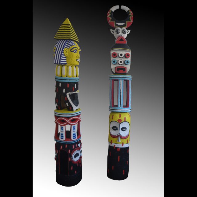 Wood, beads, glue, cotton thread, silicone mastic<br>
Left: 220 x 35 x 35 cm<br>
Right: 260 x 40 x 40 cm
