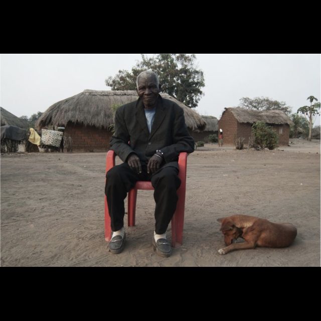 Kyubo, 2010. Chief Mpanga. He had heard about Lemaire's expedition. He knew the story told by his parents, and showed us the places thet Lemaire visited. Sammy Baloji<br>
80 cm x 120 cm<br>
Archival digital photograph on Hahnemühle Paper<br>
Edition: 5 + 1 AP